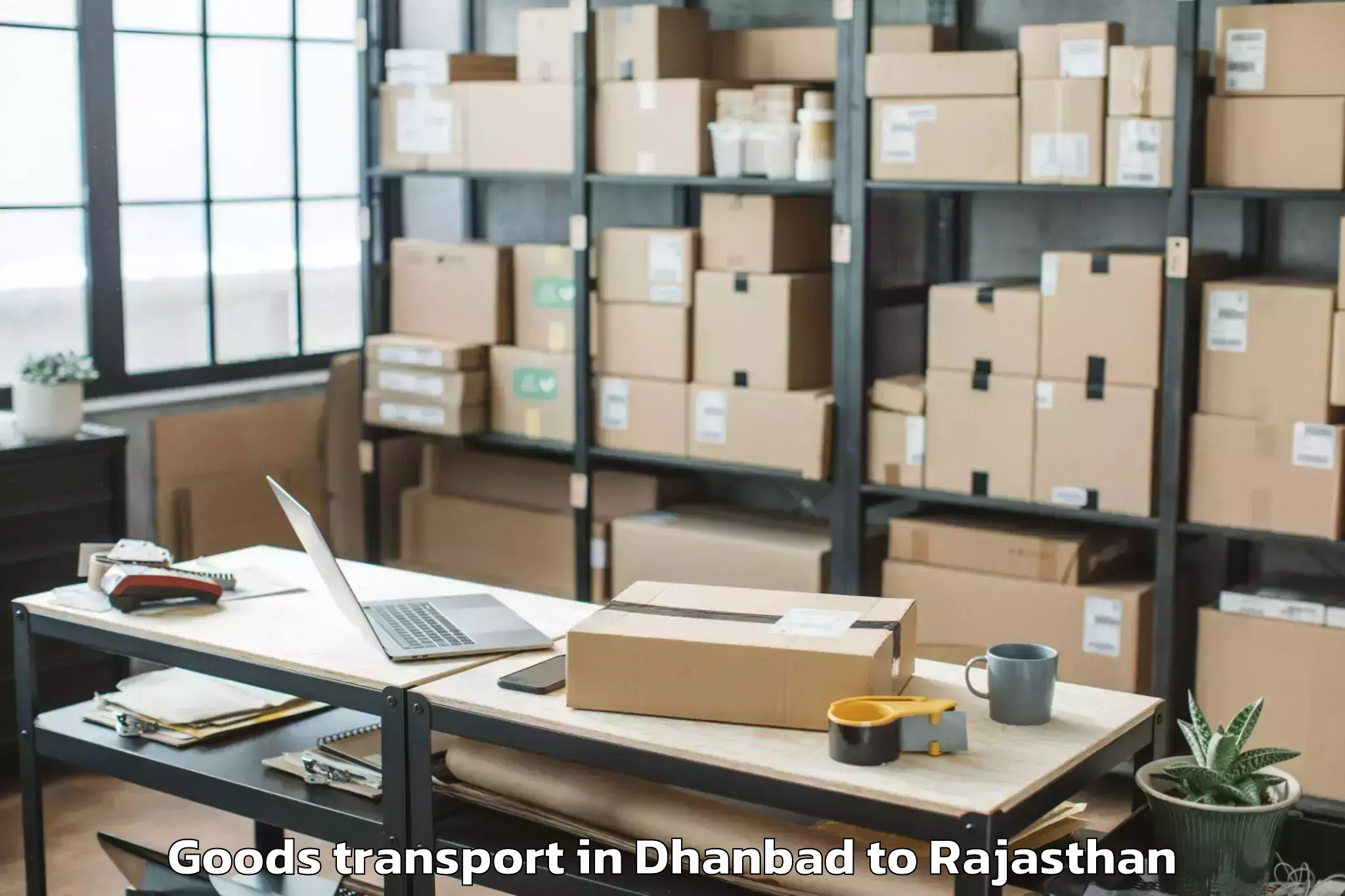 Easy Dhanbad to Chhabra Goods Transport Booking